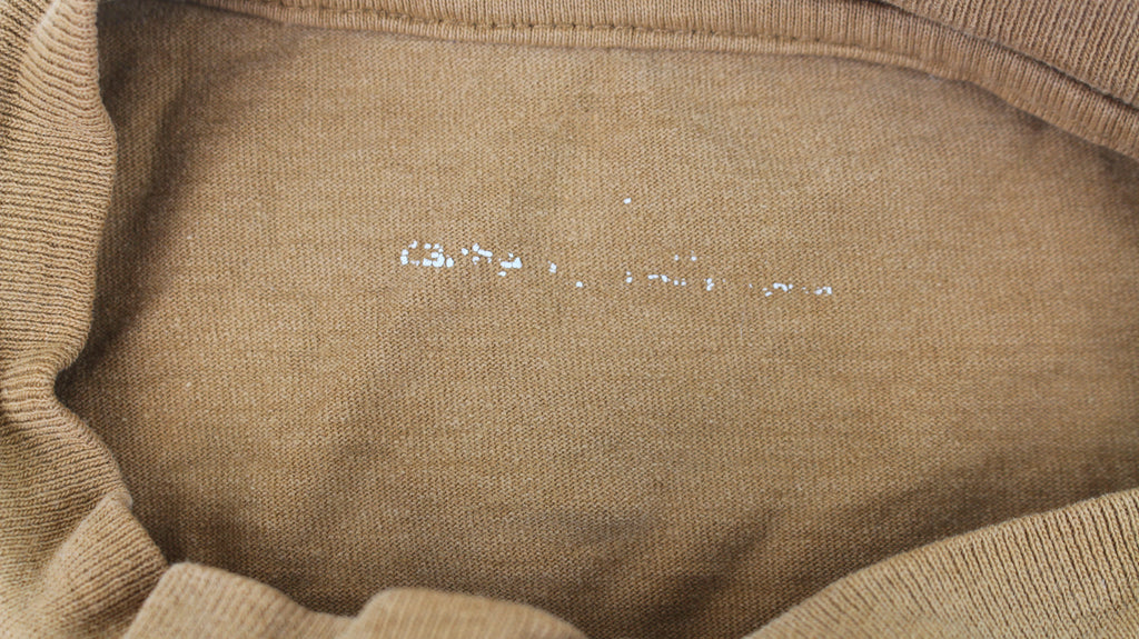 Brown Carhartt shirt